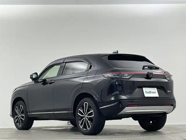 ホンダ ヴェゼル ハイブリッド e:HEV Z 愛媛県 2023(令5)年 1.8万km クリスタルブラックパール 純正９インチナビ　Ｂｌｕｅｔｏｏｔｈ　バックカメラ　レーダークルーズコントロールシートヒーター　ブラインドスポットモニター　ハーフレザーシート　ダウンヒルアシストコントロール　置くだけ充電　ETC