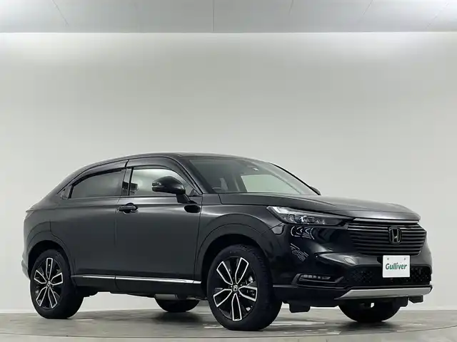 ホンダ ヴェゼル ハイブリッド e:HEV Z 愛媛県 2023(令5)年 1.8万km クリスタルブラックパール 純正９インチナビ　Ｂｌｕｅｔｏｏｔｈ　バックカメラ　レーダークルーズコントロールシートヒーター　ブラインドスポットモニター　ハーフレザーシート　ダウンヒルアシストコントロール　置くだけ充電　ETC