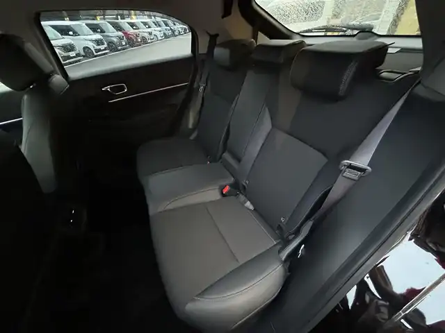 ホンダ ヴェゼル ハイブリッド e:HEV Z 愛媛県 2023(令5)年 1.8万km クリスタルブラックパール 純正９インチナビ　/Ｂｌｕｅｔｏｏｔｈ　/バックカメラ　/レーダークルーズコントロールシートヒーター　/ブラインドスポットモニター　/ハーフレザーシート　/ダウンヒルアシストコントロール　/置くだけ充電　/ETC