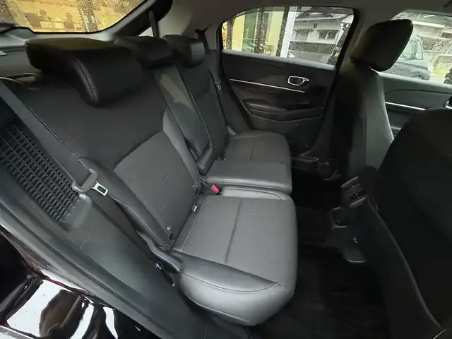 ホンダ ヴェゼル ハイブリッド e:HEV Z 愛媛県 2023(令5)年 1.8万km クリスタルブラックパール 純正９インチナビ　/Ｂｌｕｅｔｏｏｔｈ　/バックカメラ　/レーダークルーズコントロールシートヒーター　/ブラインドスポットモニター　/ハーフレザーシート　/ダウンヒルアシストコントロール　/置くだけ充電　/ETC