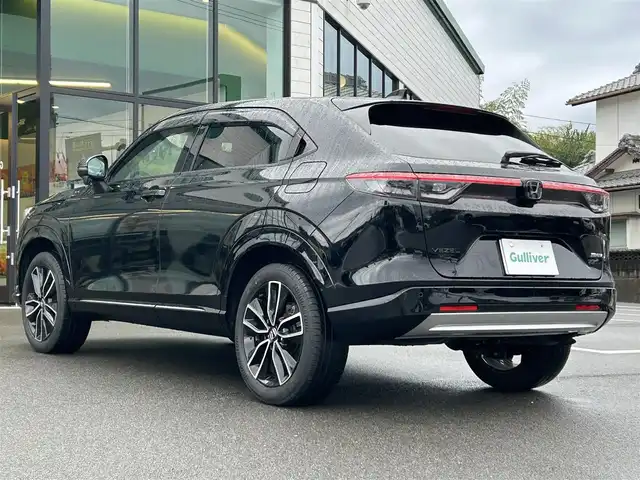ホンダ ヴェゼル ハイブリッド e:HEV Z 愛媛県 2023(令5)年 1.8万km クリスタルブラックパール 純正９インチナビ　/Ｂｌｕｅｔｏｏｔｈ　/バックカメラ　/レーダークルーズコントロールシートヒーター　/ブラインドスポットモニター　/ハーフレザーシート　/ダウンヒルアシストコントロール　/置くだけ充電　/ETC