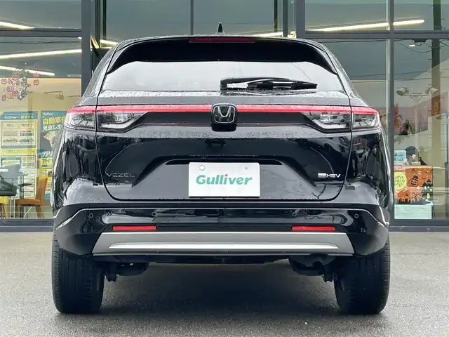 ホンダ ヴェゼル ハイブリッド e:HEV Z 愛媛県 2023(令5)年 1.8万km クリスタルブラックパール 純正９インチナビ　/Ｂｌｕｅｔｏｏｔｈ　/バックカメラ　/レーダークルーズコントロールシートヒーター　/ブラインドスポットモニター　/ハーフレザーシート　/ダウンヒルアシストコントロール　/置くだけ充電　/ETC