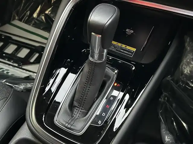 ホンダ ヴェゼル ハイブリッド e:HEV Z 愛媛県 2023(令5)年 1.8万km クリスタルブラックパール 純正９インチナビ　/Ｂｌｕｅｔｏｏｔｈ　/バックカメラ　/レーダークルーズコントロールシートヒーター　/ブラインドスポットモニター　/ハーフレザーシート　/ダウンヒルアシストコントロール　/置くだけ充電　/ETC