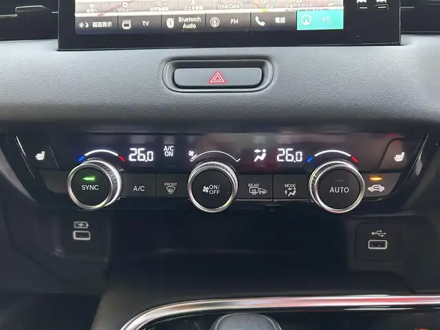 ホンダ ヴェゼル ハイブリッド e:HEV Z 愛媛県 2023(令5)年 1.8万km クリスタルブラックパール 純正９インチナビ　/Ｂｌｕｅｔｏｏｔｈ　/バックカメラ　/レーダークルーズコントロールシートヒーター　/ブラインドスポットモニター　/ハーフレザーシート　/ダウンヒルアシストコントロール　/置くだけ充電　/ETC