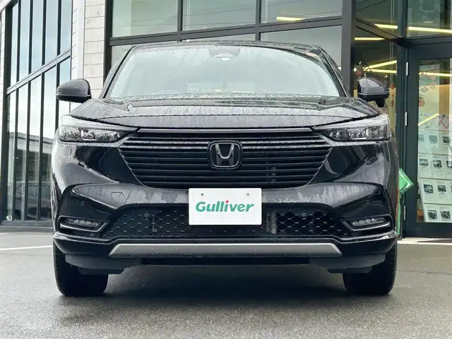 ホンダ ヴェゼル ハイブリッド e:HEV Z 愛媛県 2023(令5)年 1.8万km クリスタルブラックパール 純正９インチナビ　/Ｂｌｕｅｔｏｏｔｈ　/バックカメラ　/レーダークルーズコントロールシートヒーター　/ブラインドスポットモニター　/ハーフレザーシート　/ダウンヒルアシストコントロール　/置くだけ充電　/ETC