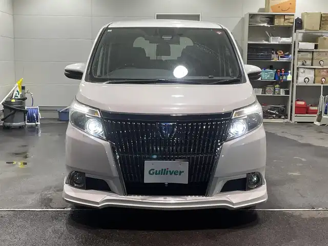 トヨタ エスクァイア ハイブリッド Gi 福島県 2016(平28)年 12.1万km ホワイトパールクリスタルシャイン ワンオーナー/アルパイン11インチナビ/CD/DVD/SD/BT/フルセグTV/アルパインフリップダウンモニター/社外17インチAW(社外AW＋冬タイヤ積込)/社外車高調ローダウン/社外フロントスポイラー/Toyota Safety Sense C/両側パワースライドドア/クルーズコントロール/合成皮革シート/シートヒーター/バックカメラ/オートハイビーム/LEDヘッドライト/ビルトインETC/プッシュスタート/ドアバイザー/フロアマット