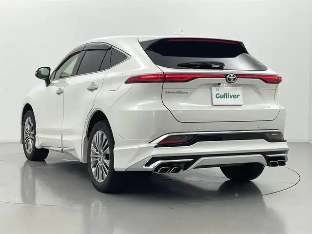 トヨタ ハリアー Z レザーパッケージ 熊本県 2020(令2)年 6.1万km ホワイトパールクリスタルシャイン モデリスタエアロ　/ＪＢＬサウンド　/純正ナビ　/全周囲カメラ　/ビルトインＥＴＣ２．０　/トヨタセーフティーセンス/・プリクラッシュセーフティ/・レーントレーシングアシスト/・レーダークルーズコントロール/・ロードサインアシスト/・ブラインドスポットモニター/・リアクロストラフィックアラート/横滑り防止/後ろのみクリアランスソナー　/ステアリングヒーター　/前席シートヒーター/前席エアーシート　/前席パワーシート　/パワーバックドア/ヘッドアップディスプレイ/デジタルインナーミラー/オートブレーキホールド/純正フロアマット/純正19インチAW/オートライト/フォグランプ/スマートキー/プッシュスタート/スペアキー1本/取扱説明書