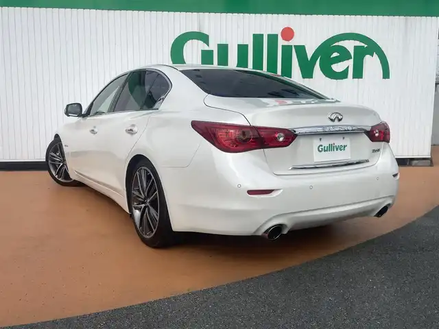 日産 スカイライン ハイブリッド 350GT Type SP 三重県 2016(平28)年 7.5万km ブリリアントホワイトパール 純正メーカーナビ/アラウンドビューモニター/全方位運転支援システム/LEDヘッドランプ/オートライト/ボディ同色電動格納ドアミラー/245/40R19タイヤ/　＊19インチアルミホイール/革巻ステアリングホイール/パドルシフト/SRSエアバック（運転席/助手席/サイド/カーテン）/左右独立温度調整機能付オートエアコン/アルミペダル/SRSダウンサス/ブラック革シート/シートヒーター（運転席/助手席）/インテリジェントキー/プッシュスタート