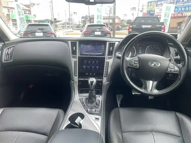 日産 スカイライン ハイブリッド 350GT Type SP 三重県 2016(平28)年 7.5万km ブリリアントホワイトパール 純正メーカーナビ/アラウンドビューモニター/全方位運転支援システム/LEDヘッドランプ/オートライト/ボディ同色電動格納ドアミラー/245/40R19タイヤ/　＊19インチアルミホイール/革巻ステアリングホイール/パドルシフト/SRSエアバック（運転席/助手席/サイド/カーテン）/左右独立温度調整機能付オートエアコン/アルミペダル/SRSダウンサス/ブラック革シート/シートヒーター（運転席/助手席）/インテリジェントキー/プッシュスタート