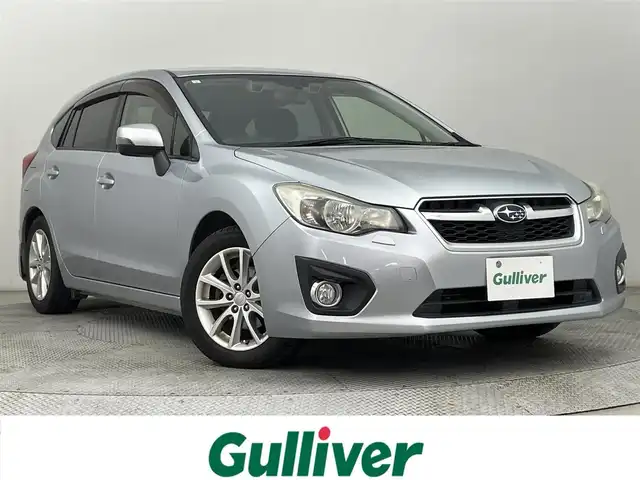 スバル インプレッサ スポーツ 2．0i アイサイト 道央・札幌 2012(平24)年 7.6万km アイスシルバーメタリック ・4WD/・社外SDナビ（AVIC-MRZ09）/CD/SD/BT/フルセグ/・バックカメラ/・ETC/・アイサイト/・横滑り防止装置/・レーンキープアシスト/・クルーズコントロール/・キセノンライト/・フォグランプ/・リモコンキー/・パドルシフト/・純正フロアマット/・純正16インチAW/・ドアバイザー/・電動格納ミラー