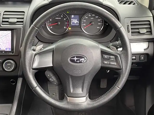 スバル インプレッサ スポーツ 2．0i アイサイト 道央・札幌 2012(平24)年 7.6万km アイスシルバーメタリック ・4WD/・社外SDナビ（AVIC-MRZ09）/CD/SD/BT/フルセグ/・バックカメラ/・ETC/・アイサイト/・横滑り防止装置/・レーンキープアシスト/・クルーズコントロール/・キセノンライト/・フォグランプ/・リモコンキー/・パドルシフト/・純正フロアマット/・純正16インチAW/・ドアバイザー/・電動格納ミラー