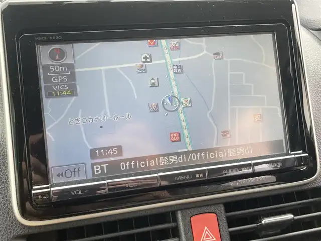 トヨタ ノア ハイブリッド G 長崎県 2014(平26)年 14.9万km ホワイトパールクリスタルシャイン 両側パワースライドドア/ディーラーOP/SDナビ【NSZT-Y62G】/Bluetooth接続/フルセグTV/DVD再生/バックカメラ/ETC/シートヒーター/ステアリングスイッチ/ベージュシート/クルーズコントロール/横すべり防止装置/後席サンシェード