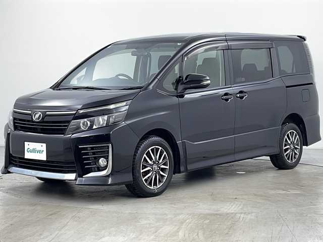 トヨタ ヴォクシー ZS 道央・札幌 2014(平26)年 7.8万km ブラック ・4WD/・寒冷地仕様/・ワンオーナー/・ALPINE9インチナビ&CD&DVD&SD&BT&TV/・両側パワースライドドア/・ドアミラーヒーター/・純正エンジンスターター付スマートキー/・社外前後ドライブレコーダー/・ステアリングスイッチ/・LEDヘッドライト/・オートライト/・純正16インチAW