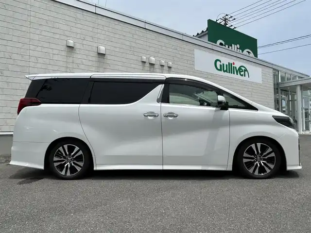 トヨタ アルファード S Cパッケージ 山形県 2020(令2)年 6.6万km ホワイトパールクリスタルシャイン 純正10インチナビ/FM/AM/DVD/CD/USB/純正フリップダウンモニター/プリクラッシュセーフティー/レーントレーシングアシスト/パーキングサポートブレーキ/TEIN車高調/ロードサインアシスト/オートハイビーム/レーダークルーズコントロール/バックカメラ/ビルトインETC2.0/前席パワーシート/前席シートヒーター /前席シートベンチレーション/運転席シートメモリー/ステアリングヒーター/ドライブレコーダー/両側パワースライドドア /パワーバックドア/100V充電/電動パーキングブレーキ/ブレーキホールド/スペアキー/保証書