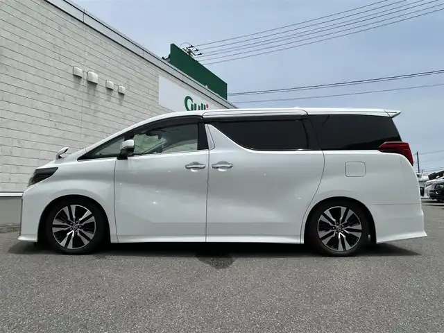 トヨタ アルファード S Cパッケージ 山形県 2020(令2)年 6.6万km ホワイトパールクリスタルシャイン 純正10インチナビ/FM/AM/DVD/CD/USB/純正フリップダウンモニター/プリクラッシュセーフティー/レーントレーシングアシスト/パーキングサポートブレーキ/TEIN車高調/ロードサインアシスト/オートハイビーム/レーダークルーズコントロール/バックカメラ/ビルトインETC2.0/前席パワーシート/前席シートヒーター /前席シートベンチレーション/運転席シートメモリー/ステアリングヒーター/ドライブレコーダー/両側パワースライドドア /パワーバックドア/100V充電/電動パーキングブレーキ/ブレーキホールド/スペアキー/保証書