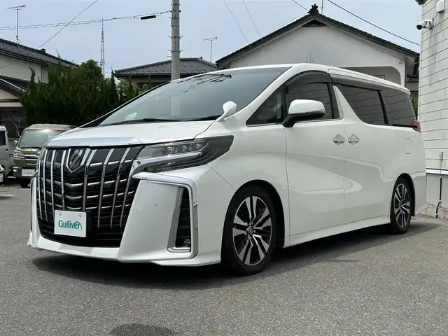 トヨタ アルファード S Cパッケージ 山形県 2020(令2)年 6.6万km ホワイトパールクリスタルシャイン 純正10インチナビ/FM/AM/DVD/CD/USB/純正フリップダウンモニター/プリクラッシュセーフティー/レーントレーシングアシスト/パーキングサポートブレーキ/TEIN車高調/ロードサインアシスト/オートハイビーム/レーダークルーズコントロール/バックカメラ/ビルトインETC2.0/前席パワーシート/前席シートヒーター /前席シートベンチレーション/運転席シートメモリー/ステアリングヒーター/ドライブレコーダー/両側パワースライドドア /パワーバックドア/100V充電/電動パーキングブレーキ/ブレーキホールド/スペアキー/保証書