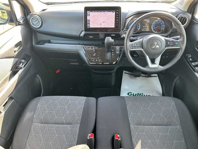 三菱 ｅＫクロス G プレミアム 石川県 2024(令6)年 0.3万km チタニウムグレーメタリック 純正９インチメモリナビ/Bluetooth/フルセグTV/MIパイロット/全方位カメラ/シートヒーター /ステアリングヒーター/４WD/デジタルインナーミラー/ワンオーナー/前後コーナーセンサー /純正１５インチアルミ/オートライト/LEDヘッドライト/踏み間違い防止