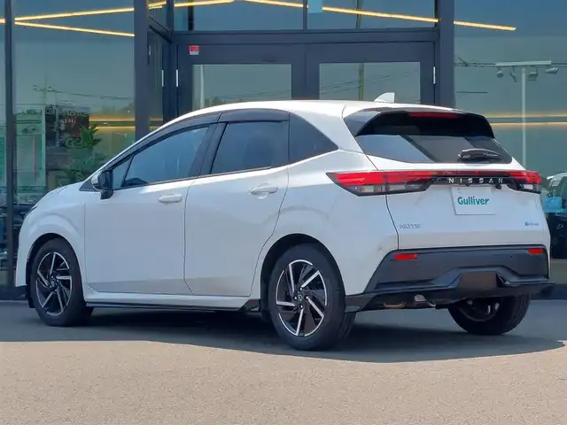 日産 ノート X 東京都 2023(令5)年 0.8万km ピュアホワイトパール 全方位運転支援システム/・エマージェンシーブレーキ/・踏み間違い衝突防止アシスト/・車線逸脱防止支援/・ハイビームアシスト/・コーナーセンサー/プッシュスタート/純正ナビ/フルセグTV/バックカメラ/ETC/ドライブレコーダー/LEDヘッドライト/ドアバイザー/16インチ純正アルミホイール