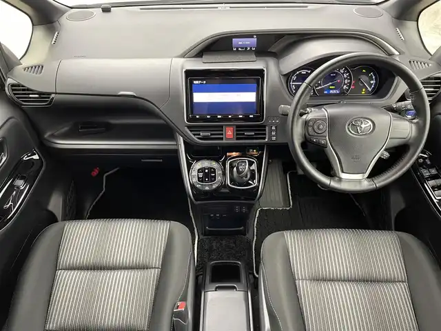 トヨタ ヴォクシー ハイブリッド ZS 煌Ⅱ 群馬県 2020(令2)年 2.7万km 黒 純正９型ナビ/１２．１型後席モニター/両側パワスラ/バックカメラ/前ドラレコ　/クルコン/ＡＨＢ/シートヒーター/アイドリングストップ/後コーナーセンサー　/ビルトインＥＴＣ　/スペアキー　/純正アルミホイール/衝突被害軽減システム/禁煙車/ＬＥＤヘッド