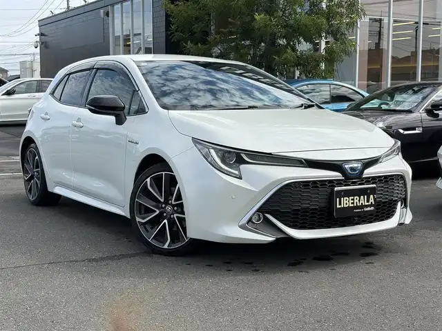 トヨタ カローラ スポーツ ハイブリッドG Z 埼玉県 2019(平31)年 8.4万km ホワイトパールクリスタルシャイン 純正ナビテレビ（NSZT-Y66T）/・DVD/CD/SD/USB/BTA/フルセグ/プリクラッシュセーフティ/先行車追随クルーズコントロール/レーンディパーチャーアラート/オートパーキングブレーキ/オートマチックハイビーム/オートヘッドライト/ステアリングヒーター/バックビューカメラ/フロントカメラ/デジタルインナーミラー/ETC2.0/カーテンエアバッグ/スマートエントリーキー/プッシュスタート