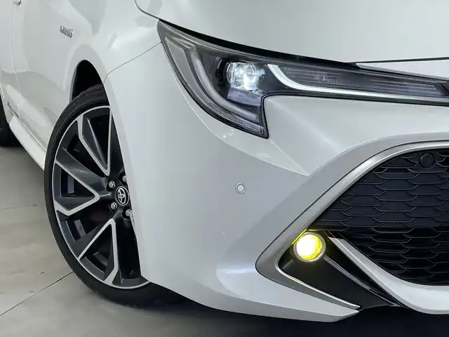 トヨタ カローラ スポーツ ハイブリッドG Z 新潟県 2019(平31)年 8.4万km ホワイトパールクリスタルシャイン 純正SDナビ【NSZT-Y66T】/　DVD/CD/SD/USB/Bluetooth/フルセグTV/プリクラッシュセーフティ/レーントレーシングアシスト/ロードサインアシスト/レーダークルーズコントロール/レーンディパーチャーアラート/ブラインドスポットモニター/オートパーキングブレーキ/オートマチックハイビーム/オートヘッドライト/前席シートヒーター/ステアリングヒーター/バックモニター/フロントカメラ/デジタルインナーミラー/ビルトインETC2.0/カーテンエアバッグ/スマートエントリーキー/プッシュスタート