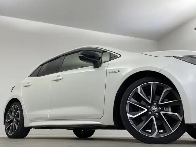 トヨタ カローラ スポーツ ハイブリッドG Z 新潟県 2019(平31)年 8.4万km ホワイトパールクリスタルシャイン 純正SDナビ【NSZT-Y66T】/　DVD/CD/SD/USB/Bluetooth/フルセグTV/プリクラッシュセーフティ/レーントレーシングアシスト/ロードサインアシスト/レーダークルーズコントロール/レーンディパーチャーアラート/ブラインドスポットモニター/オートパーキングブレーキ/オートマチックハイビーム/オートヘッドライト/前席シートヒーター/ステアリングヒーター/バックモニター/フロントカメラ/デジタルインナーミラー/ビルトインETC2.0/カーテンエアバッグ/スマートエントリーキー/プッシュスタート