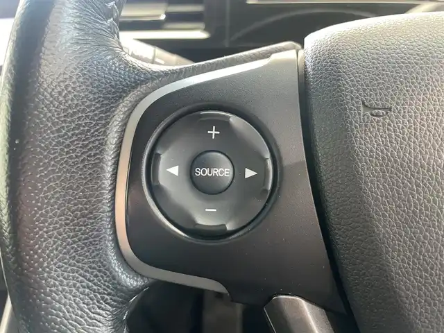 ホンダ ステップワゴン スパーダ 鹿児島県 2015(平27)年 6.6万km ホワイトオーキッドパール 禁煙車/社外ナビ【AVIC-RZ09】/（Bluetooth/フルセグTV）/社外フリップダウンモニター/バックモニター/ホンダセンシング/・衝突軽減ブレーキ/・アダプティブクルーズコントロール/・車線維持支援システム/・路外逸脱抑制機能/・誤発信抑制機能/・先行車発進お知らせ機能/・標識認識機能/両側パワースライドドア/前後ドライブレコーダー