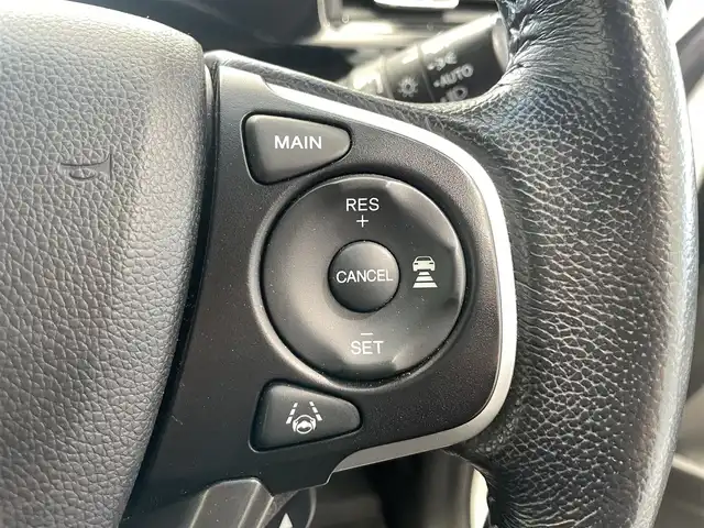 ホンダ ステップワゴン スパーダ 鹿児島県 2015(平27)年 6.6万km ホワイトオーキッドパール 禁煙車/社外ナビ【AVIC-RZ09】/（Bluetooth/フルセグTV）/社外フリップダウンモニター/バックモニター/ホンダセンシング/・衝突軽減ブレーキ/・アダプティブクルーズコントロール/・車線維持支援システム/・路外逸脱抑制機能/・誤発信抑制機能/・先行車発進お知らせ機能/・標識認識機能/両側パワースライドドア/前後ドライブレコーダー