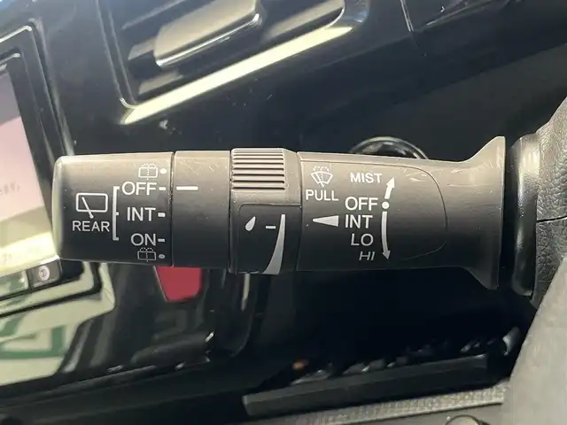 ホンダ ステップワゴン スパーダ 鹿児島県 2015(平27)年 6.6万km ホワイトオーキッドパール 禁煙車/社外ナビ【AVIC-RZ09】/（Bluetooth/フルセグTV）/社外フリップダウンモニター/バックモニター/ホンダセンシング/・衝突軽減ブレーキ/・アダプティブクルーズコントロール/・車線維持支援システム/・路外逸脱抑制機能/・誤発信抑制機能/・先行車発進お知らせ機能/・標識認識機能/両側パワースライドドア/前後ドライブレコーダー