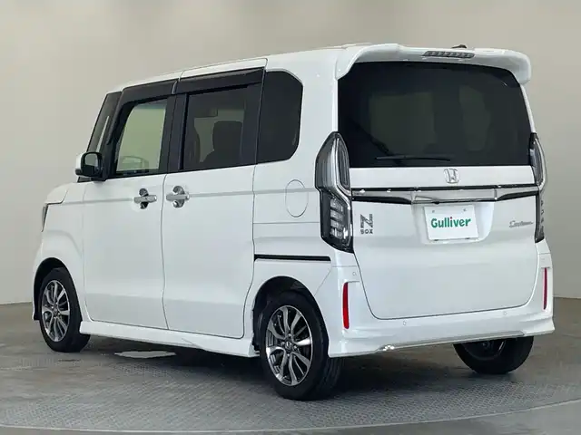 ホンダ Ｎ ＢＯＸ カスタム L 栃木県 2022(令4)年 2万km プラチナホワイトパール 純正ナビ/（CD/DVD/フルセグTV/Bluetooth/MSV）/バックカメラ/ホンダセンシング/・衝突軽減ブレーキ/・誤発進抑制機能/・アダプティブクルーズコントロール/・車線維持支援システム/・路外逸脱抑制機能/・先行車発進お知らせ機能/・標識認識機能/バックソナー/ETC/片側パワースライドドア/前席シートヒーター/オートホールド/サイド+カーテンエアバック/スマートキー/プッシュスタート/純正14インチAW/純正フロアマット/LEDヘッドライト