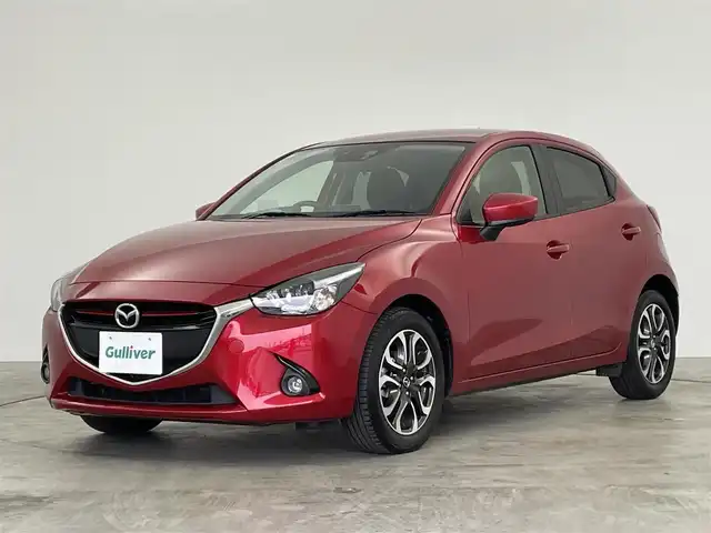 マツダ デミオ XD ツーリング 群馬県 2015(平27)年 2.2万km ソウルレッドプレミアムメタリック ワンオーナー　純正メモリーナビ　ＥＴＣＬＥＤヘッドライト　パドルシフト　スマートシティブレーキサポート　ヘッドアップディスプレイ　アドバンストキー　プッシュスタートエンジン　クルーズコントロール　純正１６インチアルミホイール　フォグ