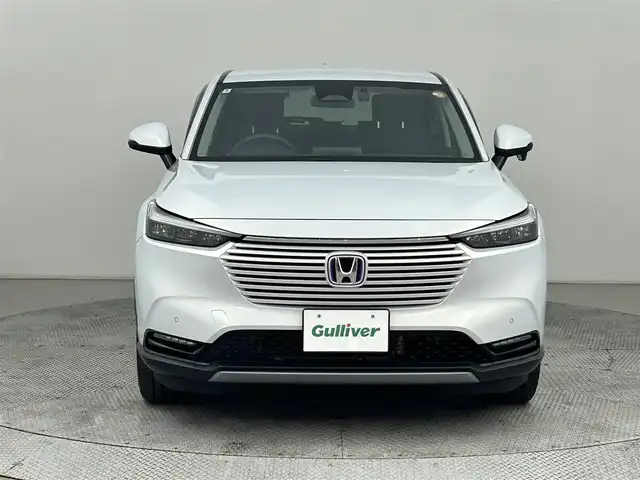 ホンダ ヴェゼル ハイブリッド e:HEV X 道央・札幌 2022(令4)年 1.1万km プレミアムサンライトホワイトパール ・４WD/・寒冷地仕様/・ホンダセンシング/・衝突軽減ブレーキ/・レーンキープアシスト/・レーダークルーズコントロール/・踏み間違え防止装置/・メーカーナビ/・バックカメラ/・フルセグTV/・Bluetooth/・ビルトインETC/・ダウンヒルアシスト/・パドルシフト/・ステアリングスイッチ/・コーナーセンサー/・横滑り防止装置/・プッシュスタート/・スマートキー/・社外ドライブレコーダー前後