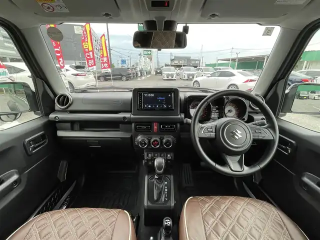 スズキ ジムニー シエラ JC 千葉県 2021(令3)年 3.1万km ミディアムグレー ワンオーナー/スズキセーフティーサポート/・デュアルセンサーブレーキサポート/・車線逸脱警報/・誤発進抑制機能/・標識認識機能/クルーズコントロール/社外ディスプレイオーディオ【PVH-9300DVSZS】/・CD/DVD/Bluetooth/バックカメラ/DEAN CROSS COUNTRY16インチアルミホイール/JAOSステップカバー/背面タイヤハードカバー/レザー調シートカバー/スマートキー/ヒルディセントコントロール/前席シートヒーター/純正LEDヘッドライト/フォグランプ/ビルトインETC2.0/カーテンエアバッグ/新車時保証書＆取扱説明書