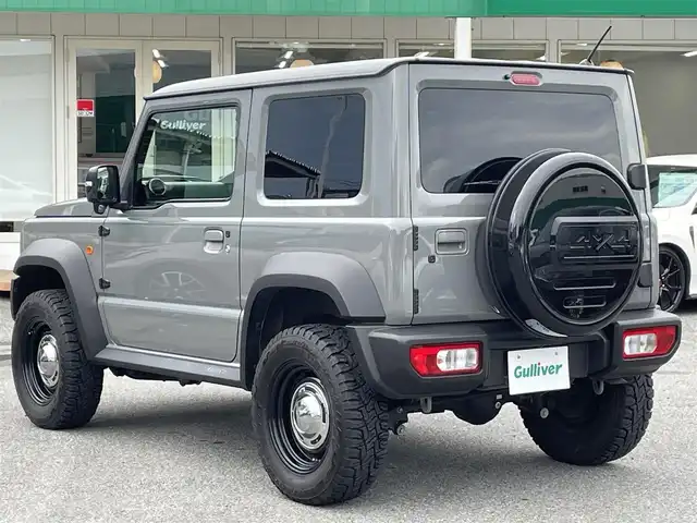 スズキ ジムニー シエラ JC 千葉県 2021(令3)年 3.1万km ミディアムグレー ワンオーナー/スズキセーフティーサポート/・デュアルセンサーブレーキサポート/・車線逸脱警報/・誤発進抑制機能/・標識認識機能/クルーズコントロール/社外ディスプレイオーディオ【PVH-9300DVSZS】/・CD/DVD/Bluetooth/バックカメラ/DEAN CROSS COUNTRY16インチアルミホイール/JAOSステップカバー/背面タイヤハードカバー/レザー調シートカバー/スマートキー/ヒルディセントコントロール/前席シートヒーター/純正LEDヘッドライト/フォグランプ/ビルトインETC2.0/カーテンエアバッグ/新車時保証書＆取扱説明書