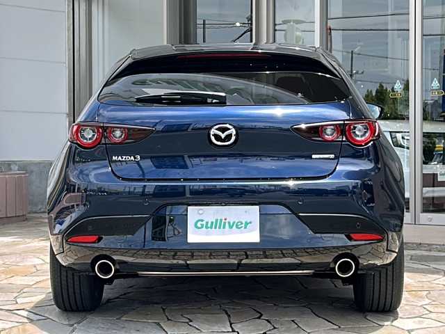 マツダ マツダ３ファストバック X バーガンディセレクション 静岡県 2021(令3)年 2.6万km ディープクリスタルブルーマイカ 【メーカーOP】/360度セーフティパッケージ（アラウンドビューモニター＋ドライバーモニタリング）/BOSEサウンドシステム＋12スピーカー/【主要装備】/純正ナビ　/アラウンドビューモニター　/レーダークルーズコントロール　/ドライブレコーダー　/プッシュスタート　/スマートキー/運転席パワーシート/前席シートヒーター/LEDヘッドライト/スペアキー有り/プリクラッシュセーフティ/横滑り防止機能/ETC/ステアリングヒーター