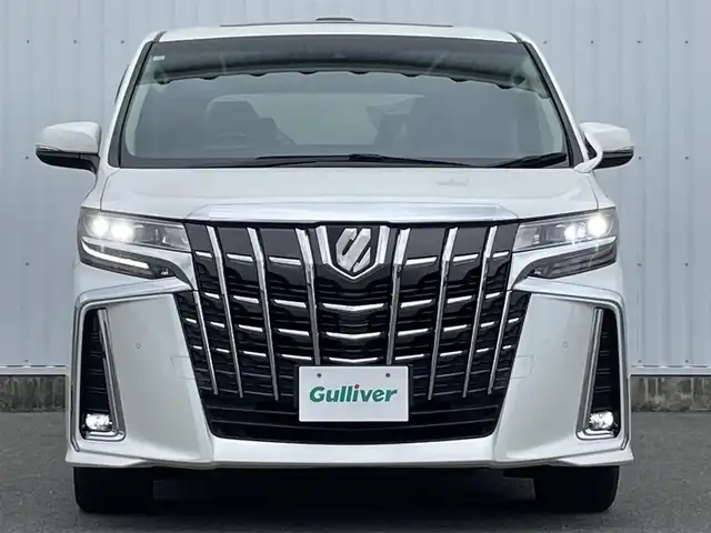トヨタ アルファード S Cパッケージ 福岡県 2018(平30)年 6.3万km ホワイトパールクリスタルシャイン 純正１０インチナビ（ＮＳＺ．Ｚ６８Ｔ）/Ｗサンルーフ/オートハイビーム/純正フリップダウンモニター/シートヒーター/エアシート/三眼ＬＥＤ/ステアリングヒーター/パワーバックドア/オートハイビーム/黒革シート/バックカメラ/ビルトインETC/クリアランスソナー/オートハイビーム/パワーシート/純正１８インチアルミホイール