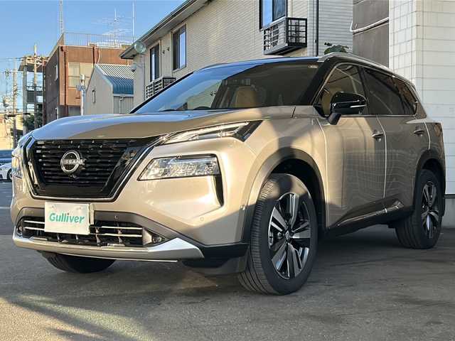 日産 エクストレイル G e－4ORCE 京都府 2024(令6)年 1.7万km ゴールド ワンオーナー　/ナッパ茶革シート　/サンルーフ　/ルーフレール/全方位カメラ　/プロパイロット　/e-Pedal /パーキングアシスト/ダウンヒルアシストコントロール/１２．３インチ純正ディスプレイオーディオナビ　/フルセグTV/Bluetooth/AppleCarPlay/USB接続/置くだけ充電/ＨＵＤ　/禁煙　/デジタルインナーミラー /純正前後ドライブレコーダー/メモリーシート /前席パワーシート/シートヒーター/LEDヘッドライト/オートライト/オートマチックハイビーム/電動リアゲート/純正AW19インチ/Wエアバッグ/カーテンエアバッグ/ETC2.0