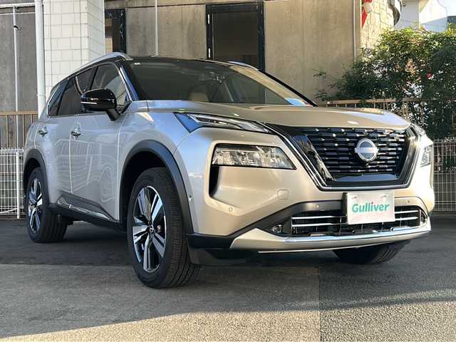 日産 エクストレイル G e－4ORCE 京都府 2024(令6)年 1.7万km ゴールド ワンオーナー　/ナッパ茶革シート　/サンルーフ　/ルーフレール/全方位カメラ　/プロパイロット　/e-Pedal /パーキングアシスト/ダウンヒルアシストコントロール/１２．３インチ純正ディスプレイオーディオナビ　/フルセグTV/Bluetooth/AppleCarPlay/USB接続/置くだけ充電/ＨＵＤ　/禁煙　/デジタルインナーミラー /純正前後ドライブレコーダー/メモリーシート /前席パワーシート/シートヒーター/LEDヘッドライト/オートライト/オートマチックハイビーム/電動リアゲート/純正AW19インチ/Wエアバッグ/カーテンエアバッグ/ETC2.0