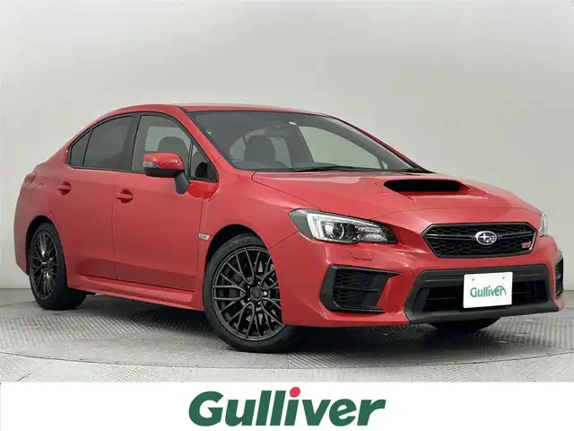 スバル ＷＲＸ ＳＴＩ STI 道央・札幌 2019(令1)年 2.3万km ピュアレッド ・４WD/・寒冷地仕様/・社外メモリナビ/・CD/DVD/BT/AUX/USB/フルセグTV/・バックカメラ/・ドライブレコーダー/・ETC/・横滑り防止装置/・ステアリングヒーター/・ステアリングスイッチ/・LEDヘッドライト/・オートライト/・電動格納ウィンカーミラー/・プッシュスタート/・スマートキー/・純正フロアマット/・スーパーターボマフラー/・純正１8インチAW/・保証書/・取扱説明書