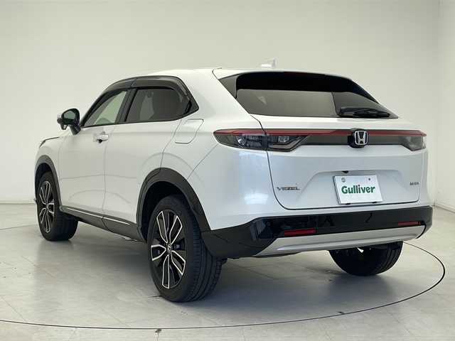 ホンダ ヴェゼル ハイブリッド e:HEV Z 千葉県 2021(令3)年 2.9万km プラチナホワイトパール ホンダセンシング/衝突軽減ブレーキ/レーンキープアシスト/レーダークルーズコントロール/アダプティブヘッドライト/クリアランスソナー/ブラインドスポットモニター/後退出庫サポート/踏み間違い防止/純正9インチメモリナビ(LXM-242ZFNi)/フルセグ/BT/USB/カープレイ/バックカメラ/ステアリングスイッチ/ステアリングヒーター/パドルシフト/純正ドライブレコーダー/ETC2.0/ワイヤレス充電/電動パーキングブレーキ/ハンズフリーアクセスパワーテールゲート/ハーフレザーシート/シートヒーター(D/N席)/スマートキー/スペアキー/プッシュスタート/LEDヘッドライト/オートライト