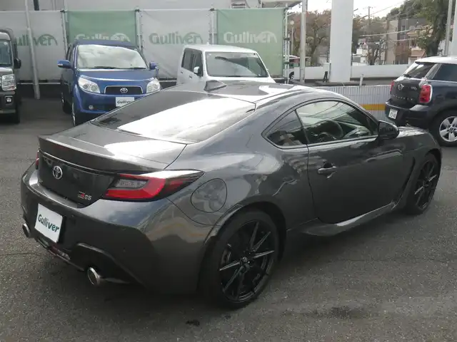 トヨタ ＧＲ８６ RZ 神奈川県 2023(令5)年 0.8万km マグネタイトグレーメタリック 6速MT/アイサイトコアテクノロジー/・プリクラッシュセーフティ/・車線逸脱警報/・ふらつき警報/・先行車発進お知らせ機能/・追従機能付クルーズコントロール/・クリアランスソナー/ワンオーナー/登録時7652km/純正9インチナビ　フルセグTV/（Bluetooth/DVD再生可/HDMI/USB/SD/レコーダーリンク）/バックカメラ/後側方警戒支援システム/GRドアスタビライザー/GRエアロスタビライングカバー/ドアミラーオートシステム/ハーフレザーシート/シートヒーター/LEDヘッドランプ/ハイビームアシスト/純正ドライブレコーダー/純正LEDルームランプ/純正2.0ETC/スマートキーx2/取説書/保証書/点検記録（全てトヨタディーラーで実施）/　R6/11  R7/10