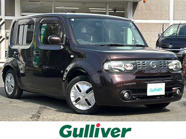 日産 キューブ 15X FOUR Vセレクション 道央・札幌 2013(平25)年 9.5万km ビターショコラ ・ワンオーナー/・4WD/・社外ナビ/フルセグTV/DVD/CD/SD/BT/・ETC/・プッシュスタート/・インテリジェントキー/・ドアバイザー/・電格ミラー/・冬タイヤ社外15インチAW積込