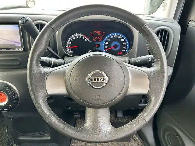 日産 キューブ 15X FOUR Vセレクション 道央・札幌 2013(平25)年 9.5万km ビターショコラ ・ワンオーナー/・4WD/・社外ナビ/フルセグTV/DVD/CD/SD/BT/・ETC/・プッシュスタート/・インテリジェントキー/・ドアバイザー/・電格ミラー/・冬タイヤ社外15インチAW積込