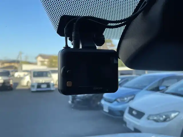 トヨタ ノア ハイブリッド S－Z 静岡県 2024(令6)年 0.1千km ホワイトパールクリスタルシャイン 純正ナビTV/（CD/DVD/BT）/バックカメラ/トヨタセーフティセンス/両側パワースライドドア/レーダークルーズコントロール/プリクラッシュセーフティ/レーンキープアシスト/横滑り防止装置/HDMI/ETC2.0/AC100V/ハーフレザーシート/前席シートヒーター/電動パーキングブレーキ/オートホールド/LEDヘッドライト/オートマチックハイビーム/前後型ドライブレコーダー/純正17インチアルミホイール/スマートキー/プッシュスタート/保証書