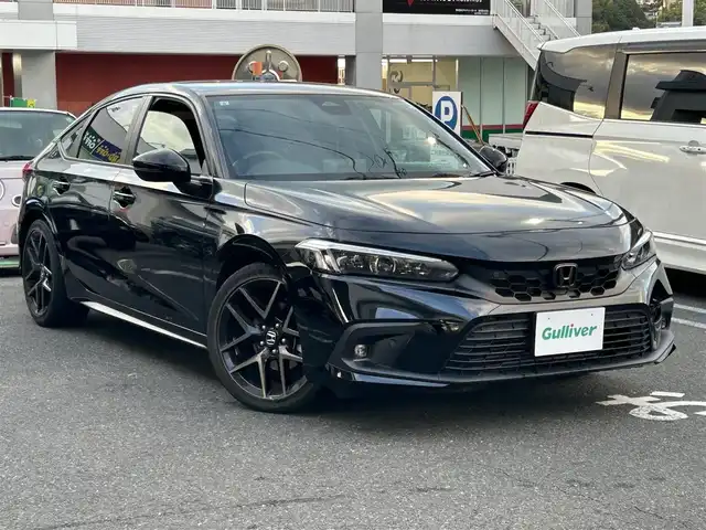 ホンダ シビック EX 長崎県 2021(令3)年 3万km クリスタルブラックパール 純正ナビ付ディスプレイオーディオ（AM/FM/TV)/ブルートゥース/クルーズコントロール追従あり/レーンキープアシスト/衝突軽減ブレーキ/電子パーキングブレーキ/ブレーキホールド/横滑り防止装置/スマートホン非接触準電/バックカメラ/シートヒーター（前席）/ブラインドスポットモニター/踏み間違い衝突軽減/路外逸脱抑制機能/純正アルミホイール/コーナーセンサー（前後）