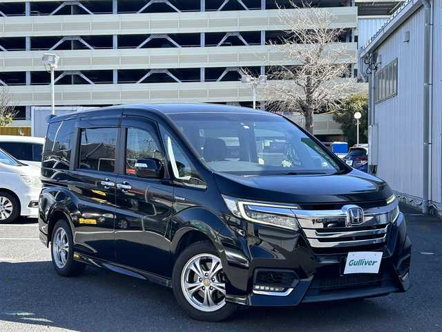 ホンダ ステップワゴン スパーダ ハイブリッド G ホンダセンシング 静岡県 2018(平30)年 14.7万km プレミアムスパークルブラックパール ワンオーナー/純正ナビ（FM/AM/CD/BT/HDMI/TV）/アラウンドビューモニター/ドライブレコーダー/ビルトインETC/クルーズコントロール/フリップダウンモニター/両側パワースライドドア/純正AW有り