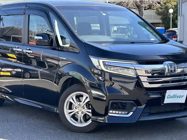 ホンダ ステップワゴン スパーダ ハイブリッド G ホンダセンシング 静岡県 2018(平30)年 14.7万km プレミアムスパークルブラックパール ワンオーナー/純正ナビ（FM/AM/CD/BT/HDMI/TV）/アラウンドビューモニター/ドライブレコーダー/ビルトインETC/クルーズコントロール/フリップダウンモニター/両側パワースライドドア/純正AW有り