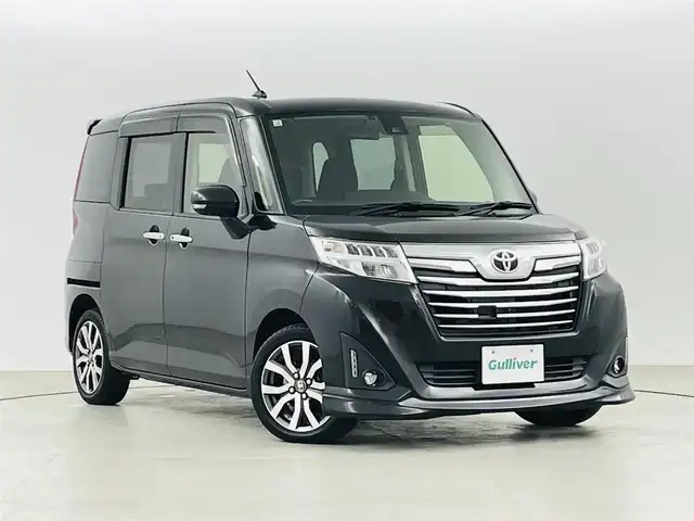 トヨタ ルーミー カスタムG－T 福島県 2017(平29)年 14.9万km ブラックマイカメタリック 社外メモリーナビゲーション/型式：AVIC-CL900/【AM/FM/CD/DVD/Bluetooth/フルセグTV】/・全方位カメラ/・ビルトインETC/プリクラッシュセーフティ/車線逸脱警報装置/両側パワースライドドア/オートライト/・LEDヘッドライト/・フロントフォグライト/横滑り防止装置/アイドリングストップ/純正フロアマット/ドアバイザー/電動格納ウィンカーミラー/後席ISOFIX/プッシュスタート/・スマートキー/取扱説明書/・保証書