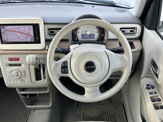 スズキ ラパン X 三重県 2020(令2)年 0.6万km ノクターンブルーパール 社外ナビ/コーナーセンサー/衝突軽減ブレーキ/レーンキープアシスト/横滑り防止/アイドリングストップ/革巻きステアリング/純正フロアマット/前席シートヒーター/電動格納ミラー/禁煙車