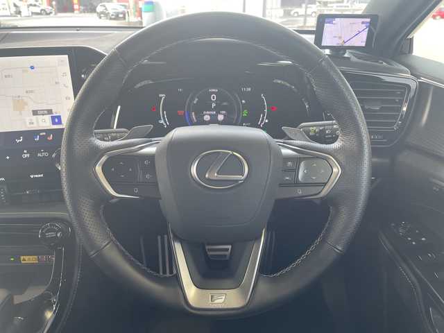 レクサス ＮＸ 450h+ Fスポーツ 愛媛県 2023(令5)年 0.7万km グラファイトブラックガラスフレーク ワンオーナー/純正14インチディスプレイオーディオナビ/（Bluetooth/フルセグTV/AM/FM）/全方位カメラ/サンルーフ/ビルトインETC2.0/TRDエアロ/TRDマフラー/レザーシート/シートヒーター/シートクーラー/ステアリングヒーター/デジタルインナーミラー/置くだけ充電/クルーズコントロール/オレンジキャリパー/ヘッドアップディスプレイ/ブラインドスポットモニター/充電ケーブル